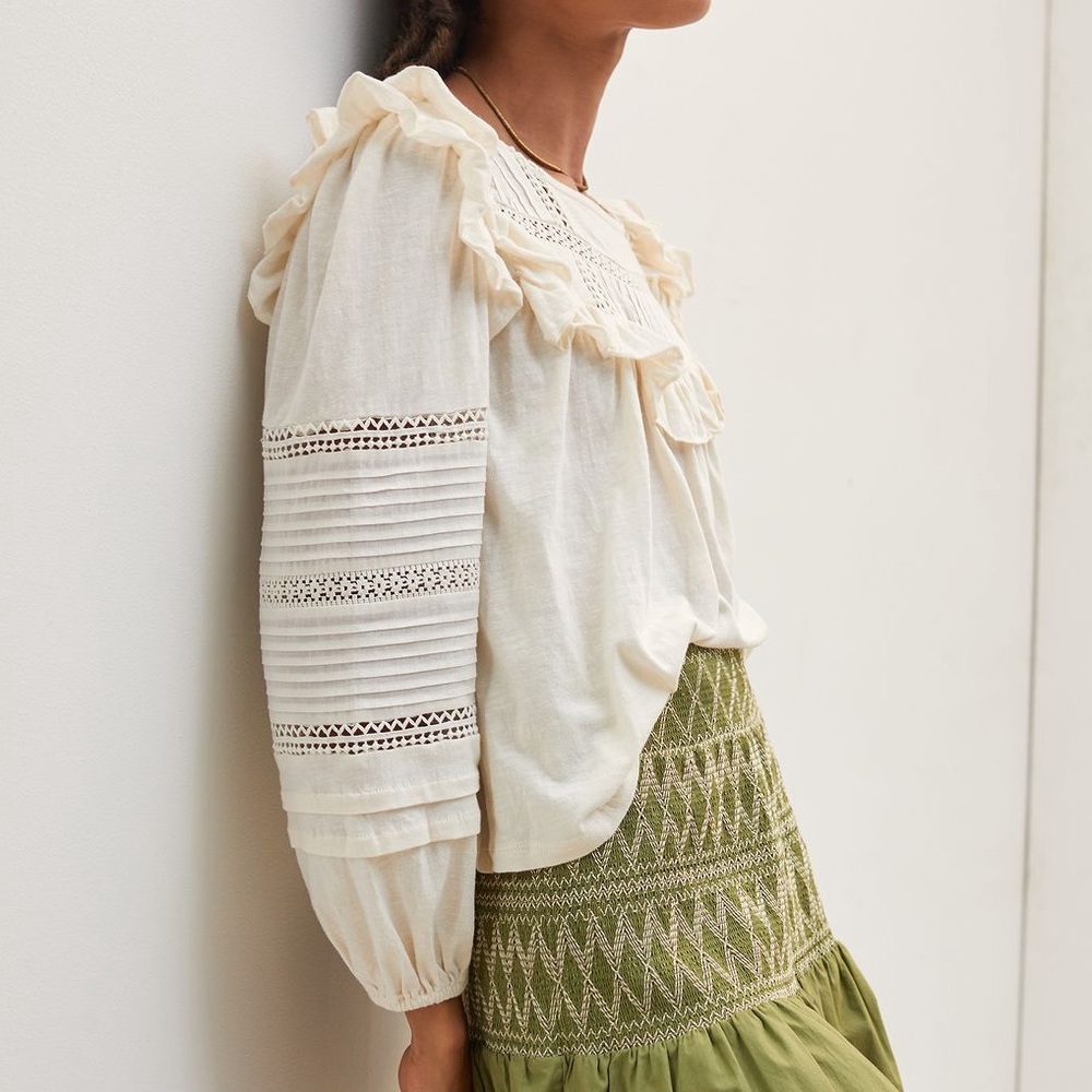Anthropologie cream ruffled lace blouse